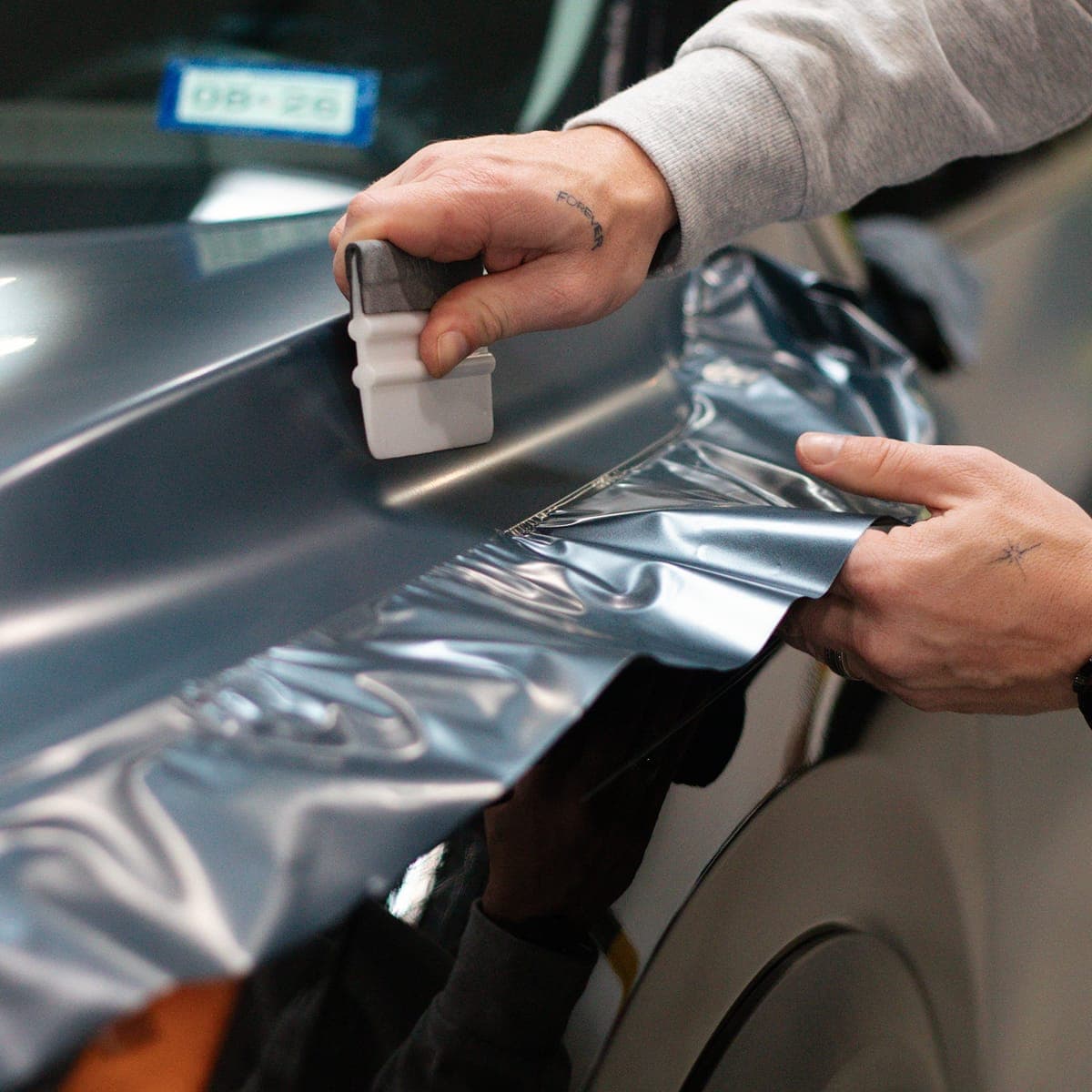 Installation of vinyl wrap on vehicle
